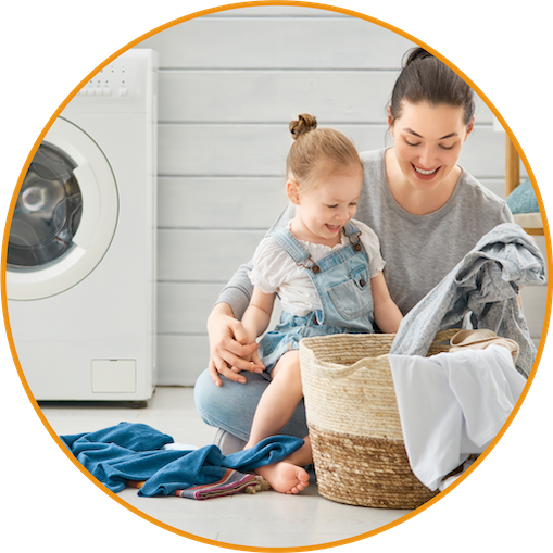 a woman and her child doing laundry